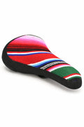 BMX bike seat with colorful striped fabric and black trim on white background