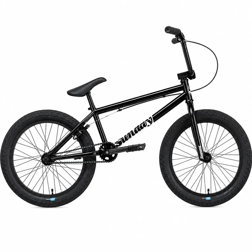 Vélo BMX Sunday noir avec pneus larges sur fond blanc