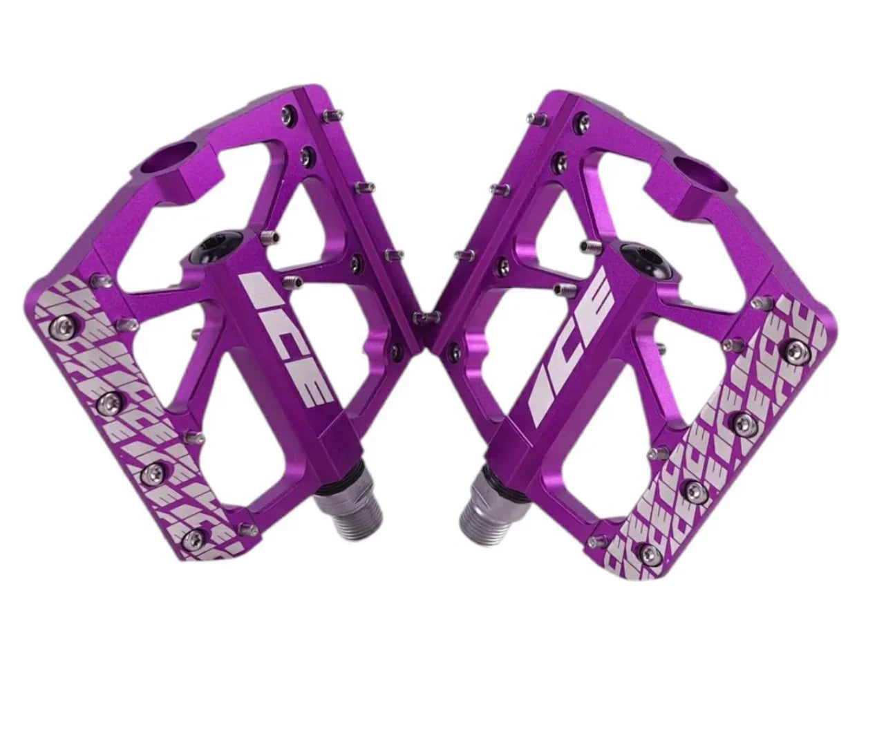 Pédales BMX violettes en aluminium avec design robuste et grip texturé