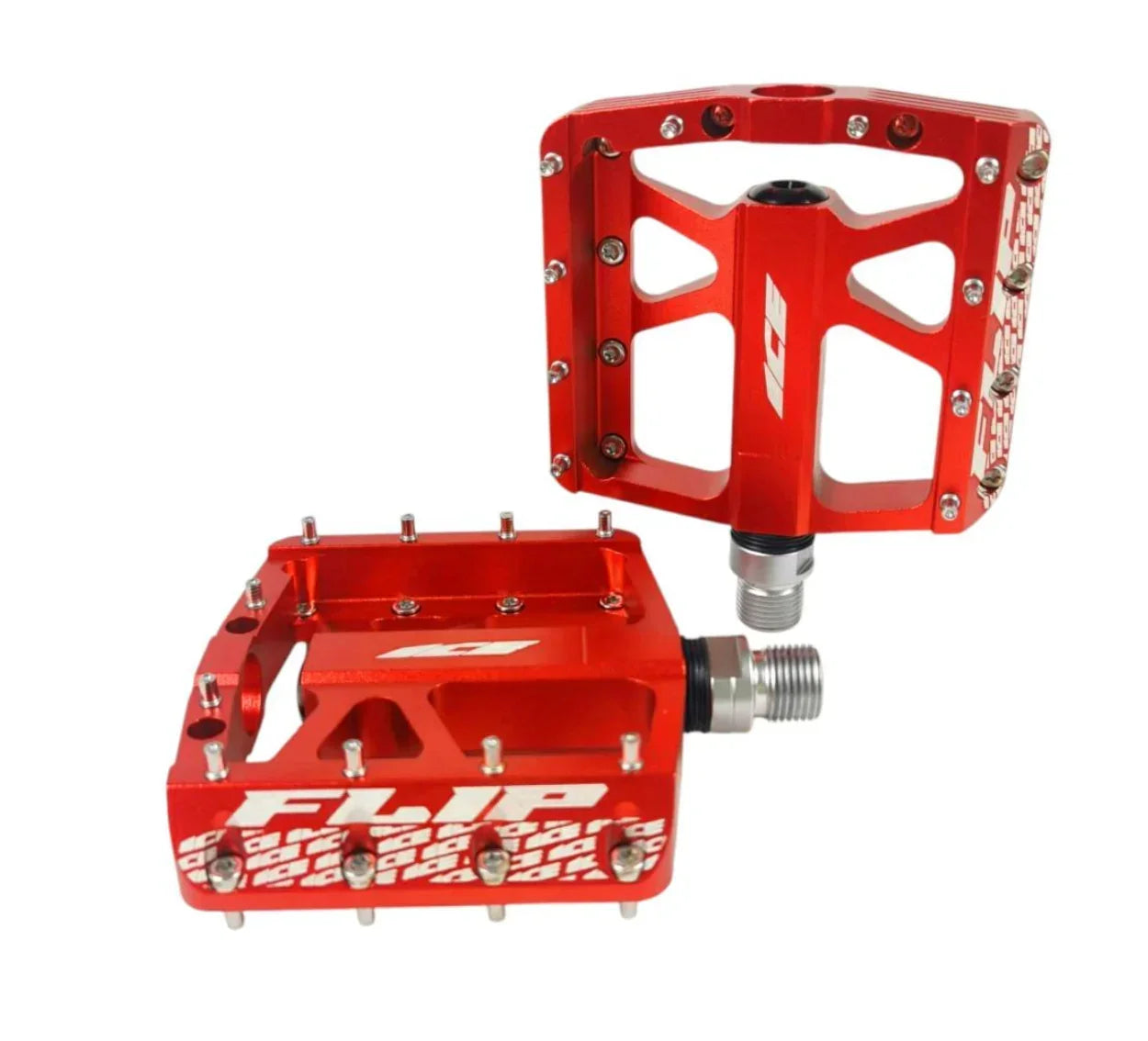 Pédales BMX rouges FLIP avec crampons, design robuste pour freestyle et tricks