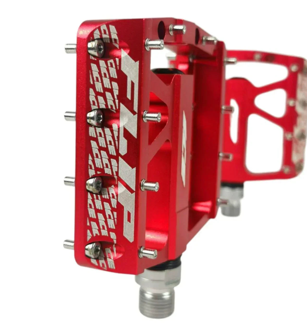 Pédale BMX rouge en aluminium avec vis et logo gravé, robuste et légère pour freestyle
