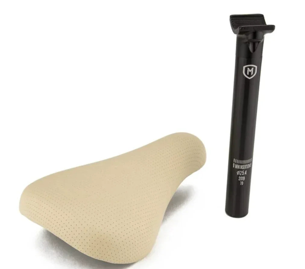 Selle BMX beige perforée et tige de selle noire pour vélo de freestyle