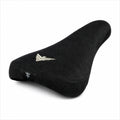 Selle BMX noire texturée avec logo doré et symbole distinctif