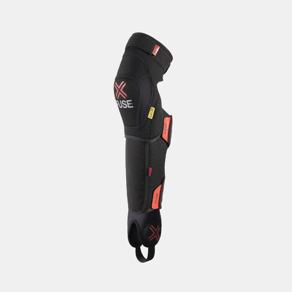 Black BMX knee and shin pad combo with red and yellow logo details on white background