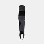 Black BMX knee pad with open back design and Velcro strap, displayed upright on white background