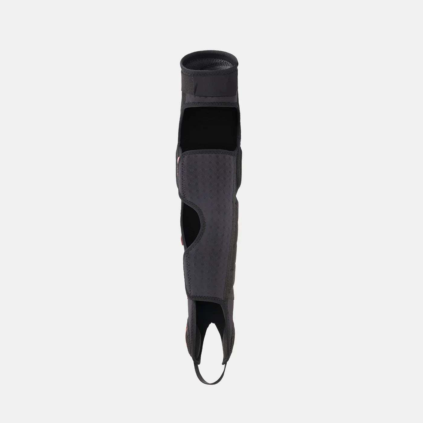 Black BMX knee pad with open back design and Velcro strap, displayed upright on white background