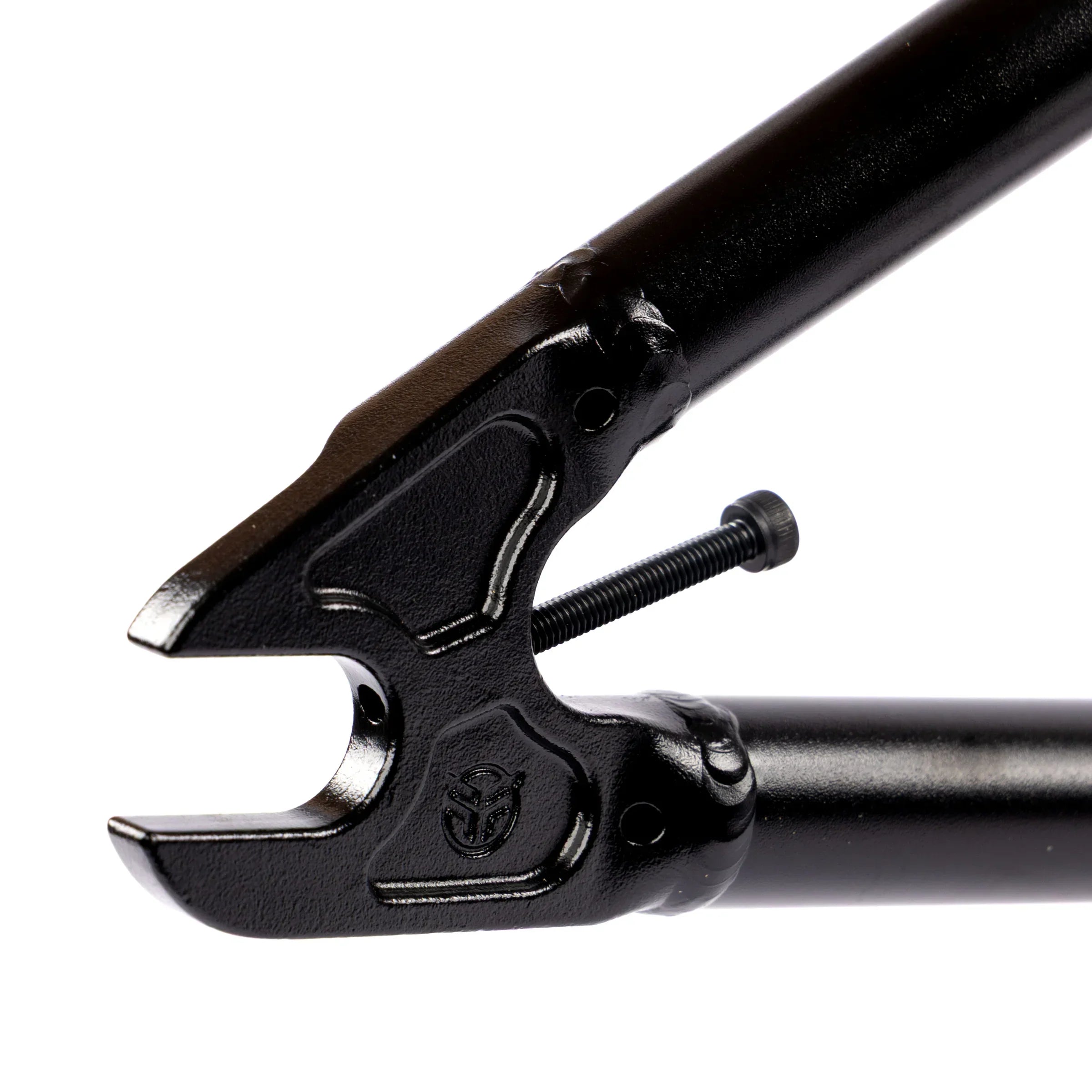 Close-up of black BMX bike frame dropout with tensioner screw, isolated on white