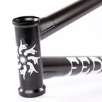 Matte black BMX bike frame with white graphics and bold lettering on the downtube