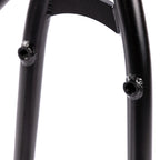Close-up of black BMX bike frame brake mounts and weld details
