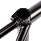 Close-up of black BMX bike frame seat clamp and welded joints