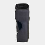 Grey BMX shin guard pad with breathable, perforated material on white background