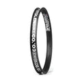 Black 18-inch BMX bike rim with bold white Rampage and StolenBikeCo graphics