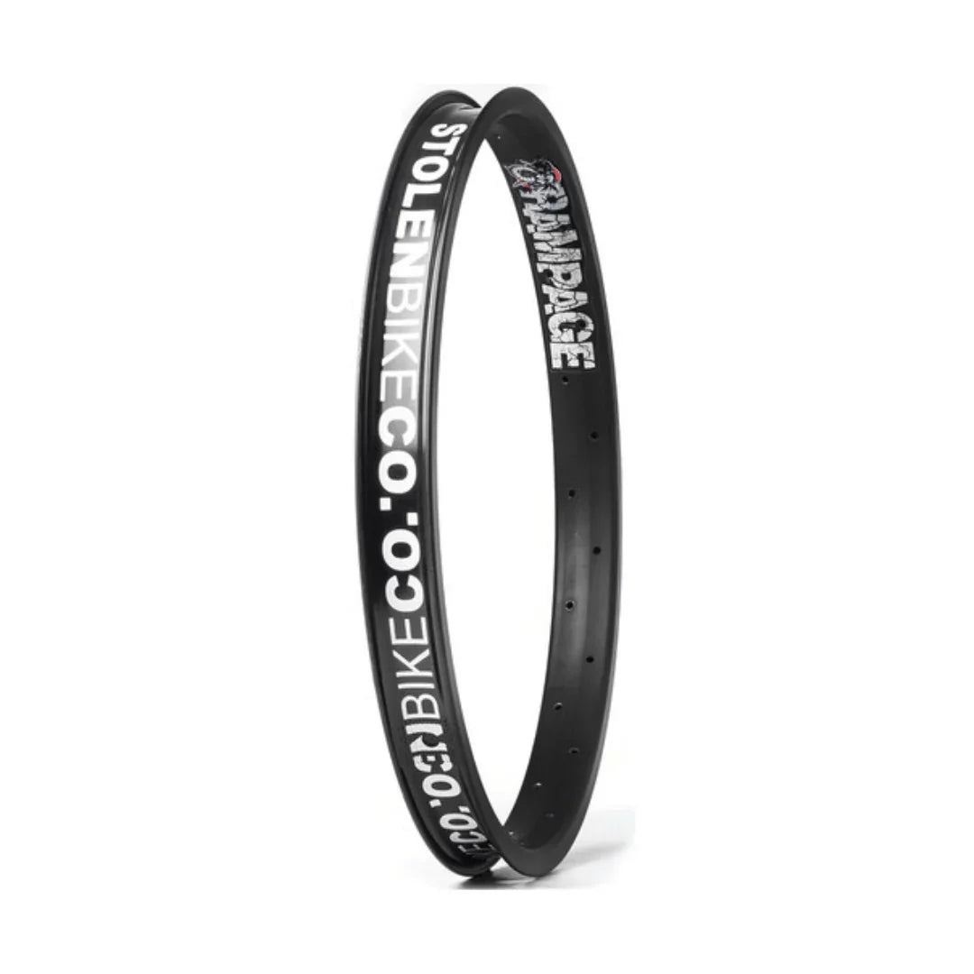 Black 18-inch BMX bike rim with bold white Rampage and StolenBikeCo graphics