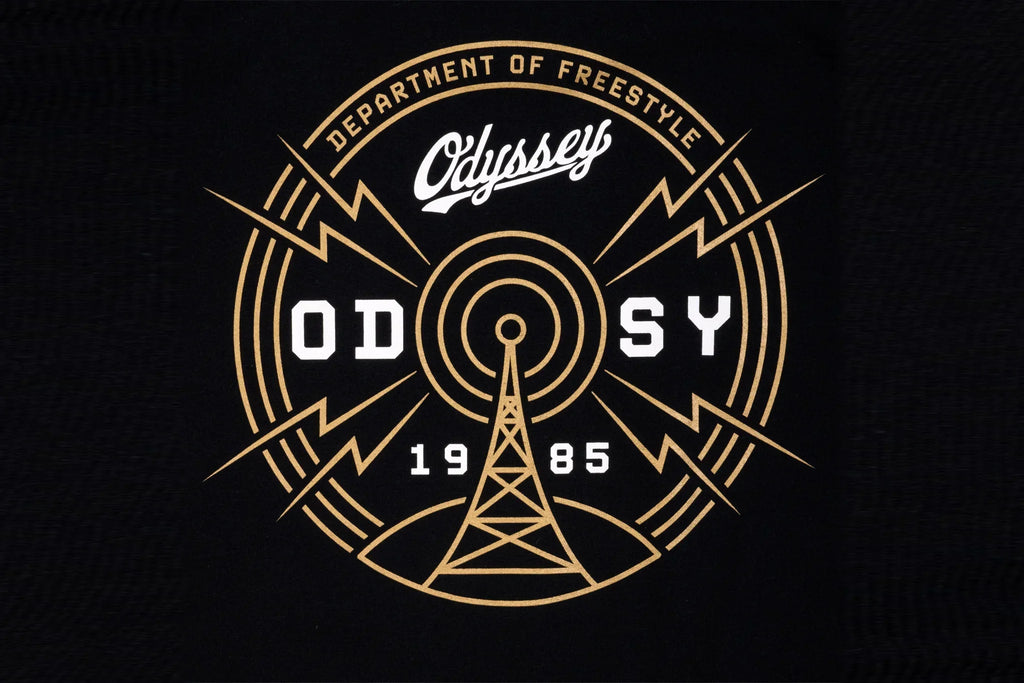 Logo Odyssey Department of Freestyle 1985 avec tour radio et éclairs dorés sur fond noir