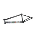 Black BMX bike frame with colorful graphics on the downtube, isolated on white background.