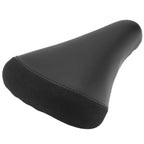 Black BMX bike seat with textured rear panel and smooth tapering design