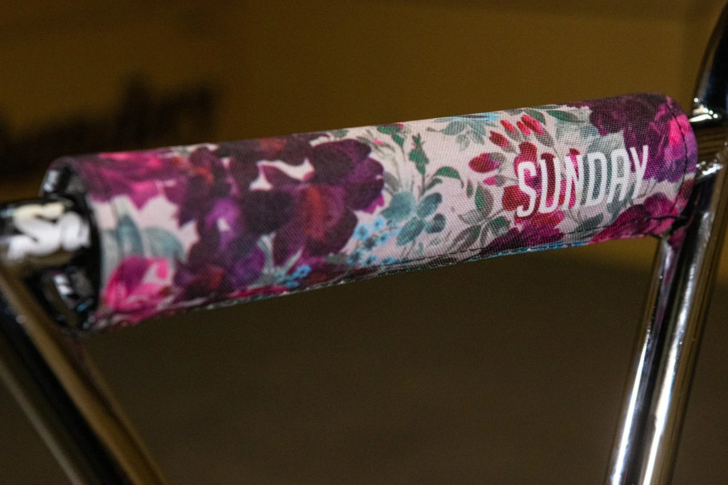 Poignée de guidon BMX Sunday avec motif floral violet et rose