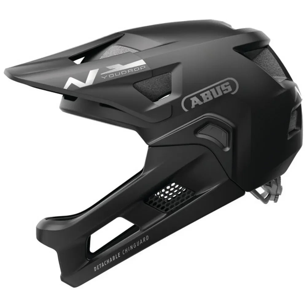 Casque BMX noir ABUS Youdrop avec mentonnière amovible, design aérodynamique et ventilation