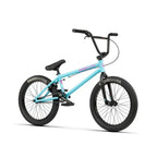 Vélo BMX bleu clair avec pneus RadioBikeCo, cadre robuste et guidon noir