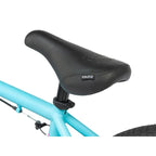 Selle BMX Radio noire sur cadre turquoise, design ergonomique pour freestyle et tricks