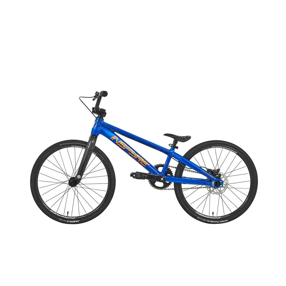 Vélo BMX bleu avec cadre robuste et freins à disque, idéal pour les tricks et la rue
