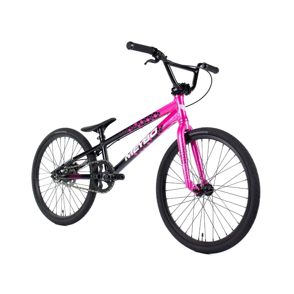 Vélo BMX rose et noir avec cadre graphique, idéal pour tricks et freestyle