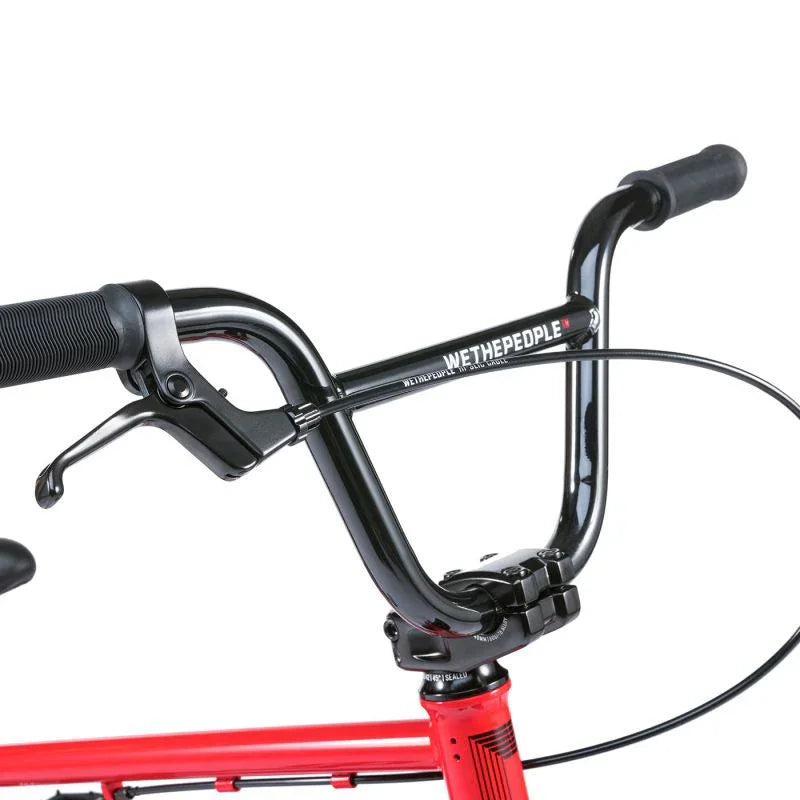 Guidon BMX noir avec poignées et leviers de frein, cadre rouge, logo WETHEPEOPLE visible