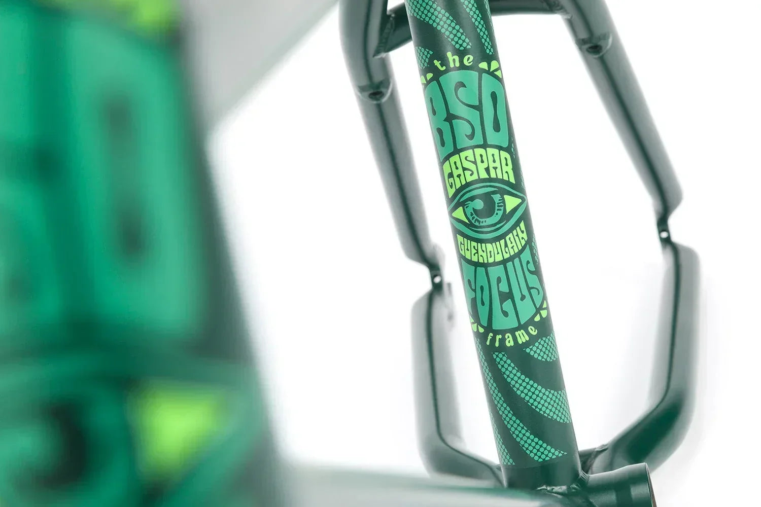 Cadre BMX BSD Gaspar Focus vert avec graphisme œil et motifs géométriques.