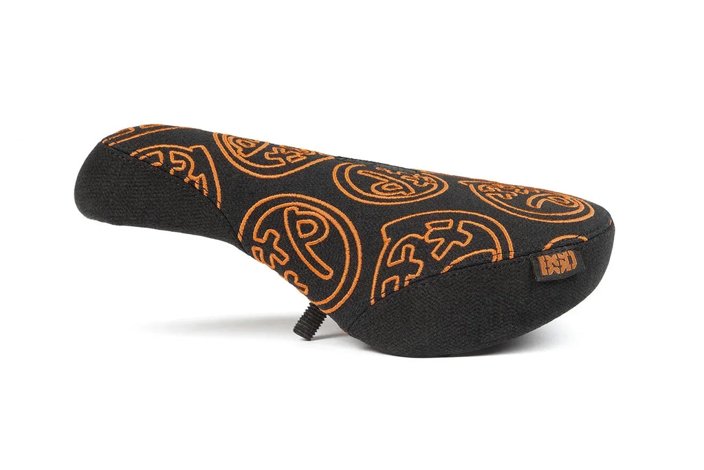 Selle de BMX noire avec motifs circulaires orange