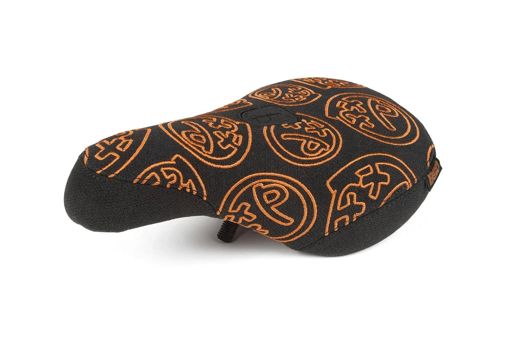 Selle de BMX noire avec motifs ornementaux orange