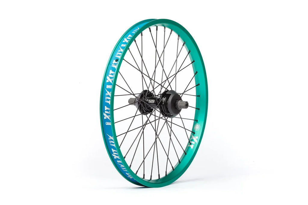 Roue BMX verte avec jante XT et moyeu noir, design robuste pour performance