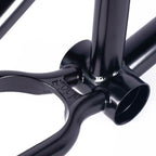 Close-up of black BMX bike frame bottom bracket and welded joints