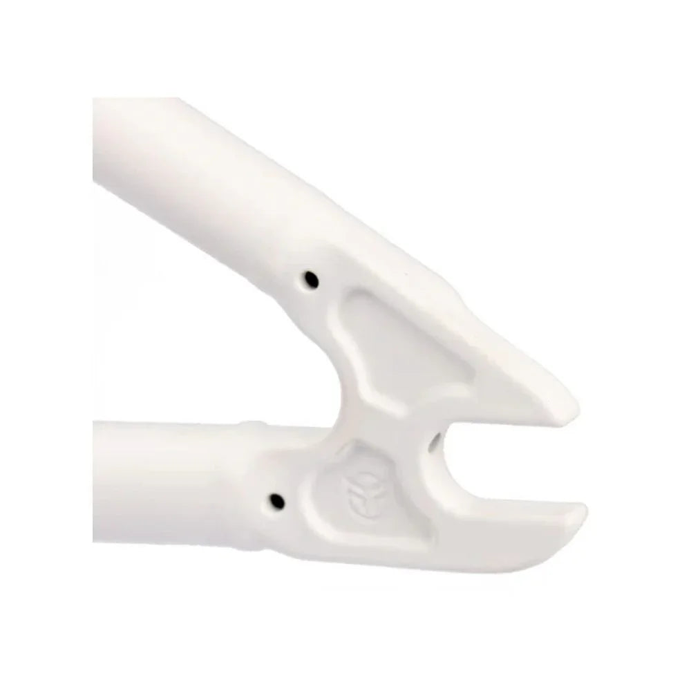 Close-up of matte white BMX bike frame dropout with detailed welds