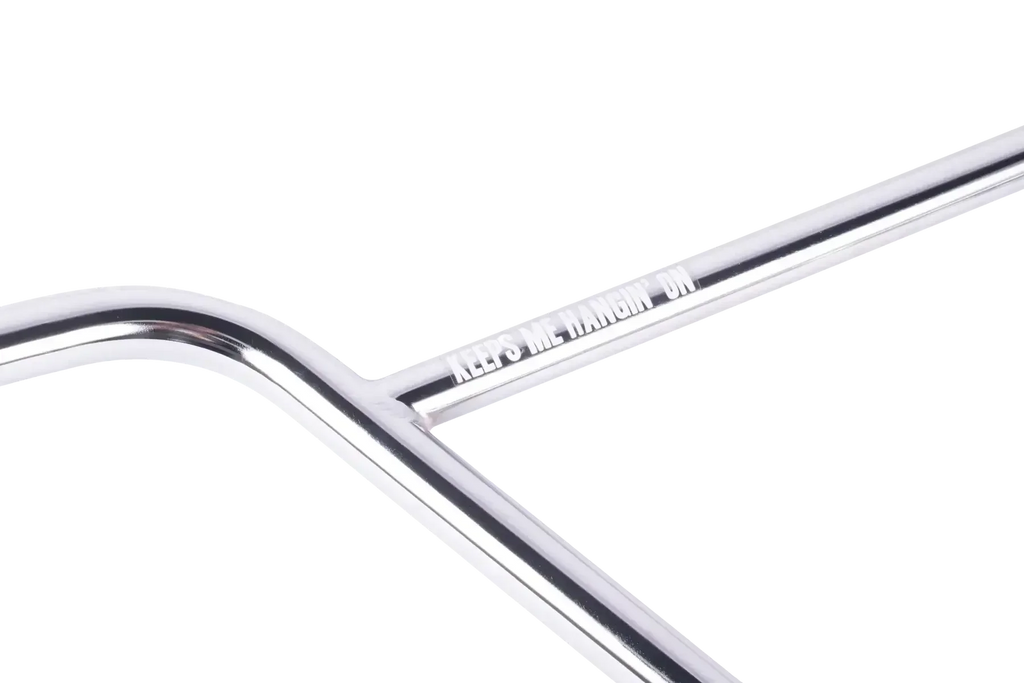 Guidon BMX chromé avec inscription 'KEEPS ME HANGIN' ON', design robuste pour freestyle
