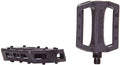 Pédales BMX noires avec grip antidérapant et montage robuste pour vélo de freestyle