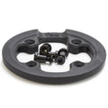 Black BMX sprocket guard with four mounting bolts on white background