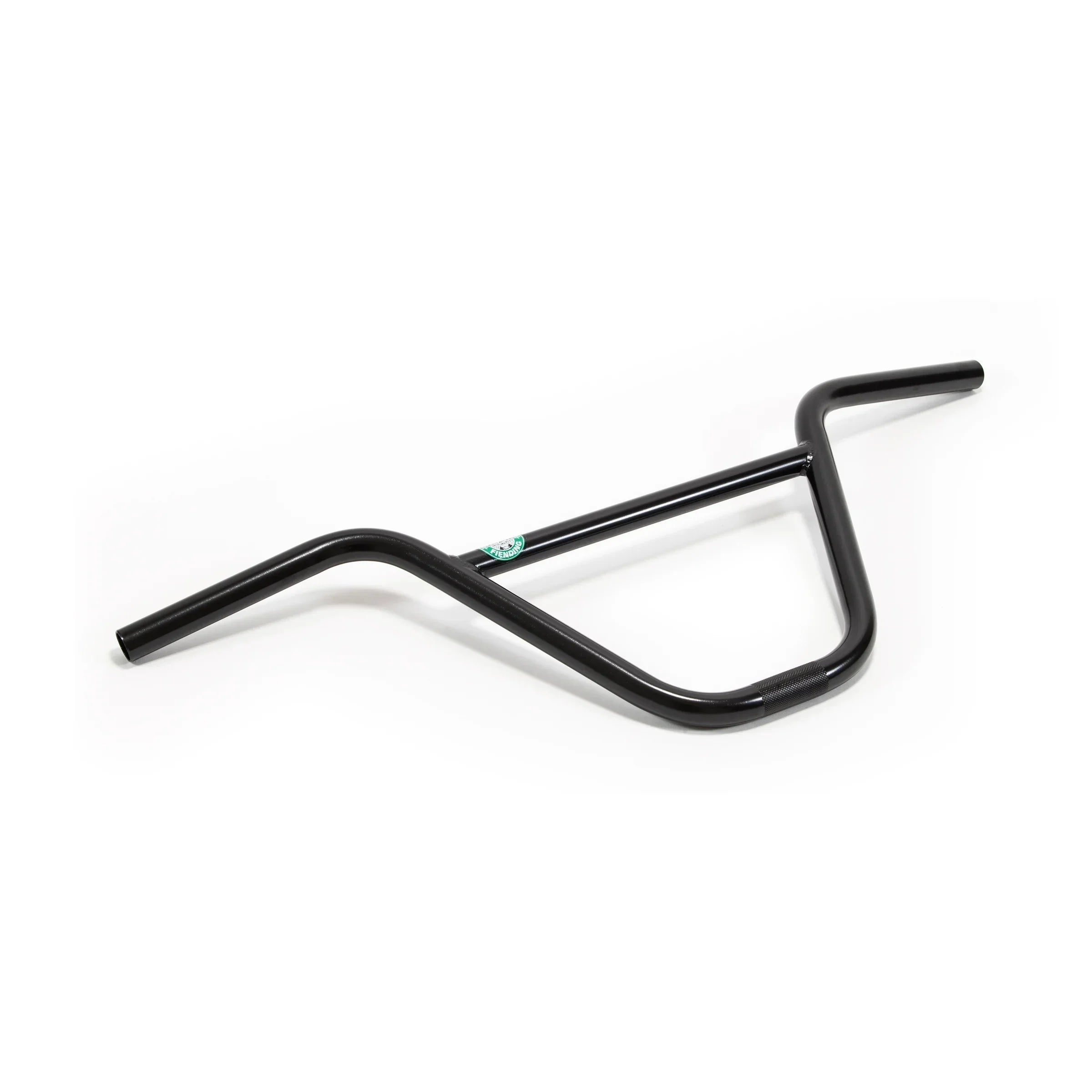 Guidon BMX noir en acier, posé sur fond blanc, adapté pour vélo freestyle.