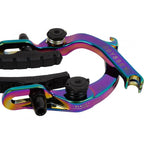 Rainbow anodized BMX brake arms with black brake pads and adjustment bolts