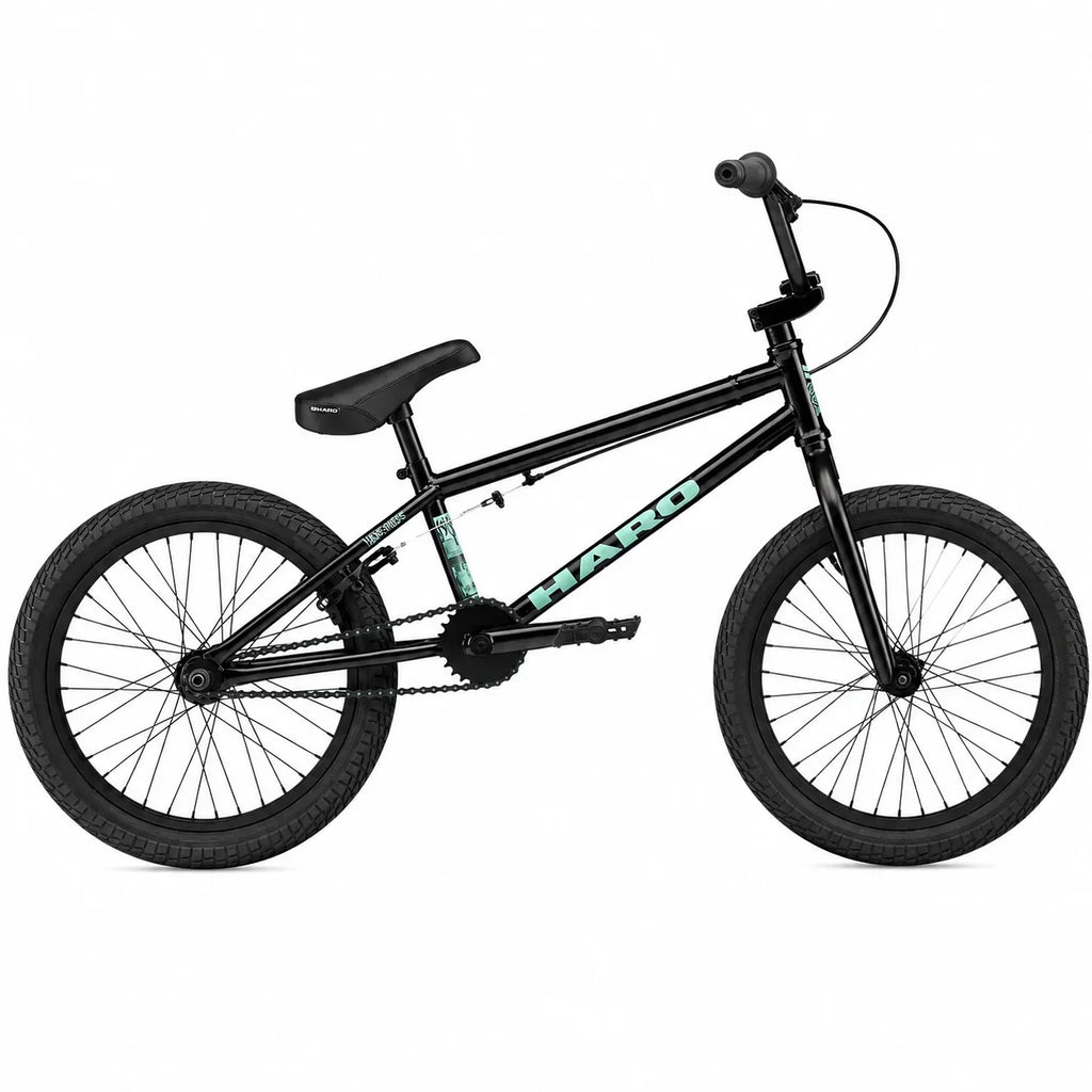 Vélo BMX Haro noir avec lettrage turquoise sur fond blanc