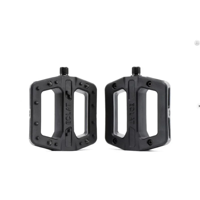 Pédales BMX noires ECLAT avec crampons, design robuste pour freestyle et street