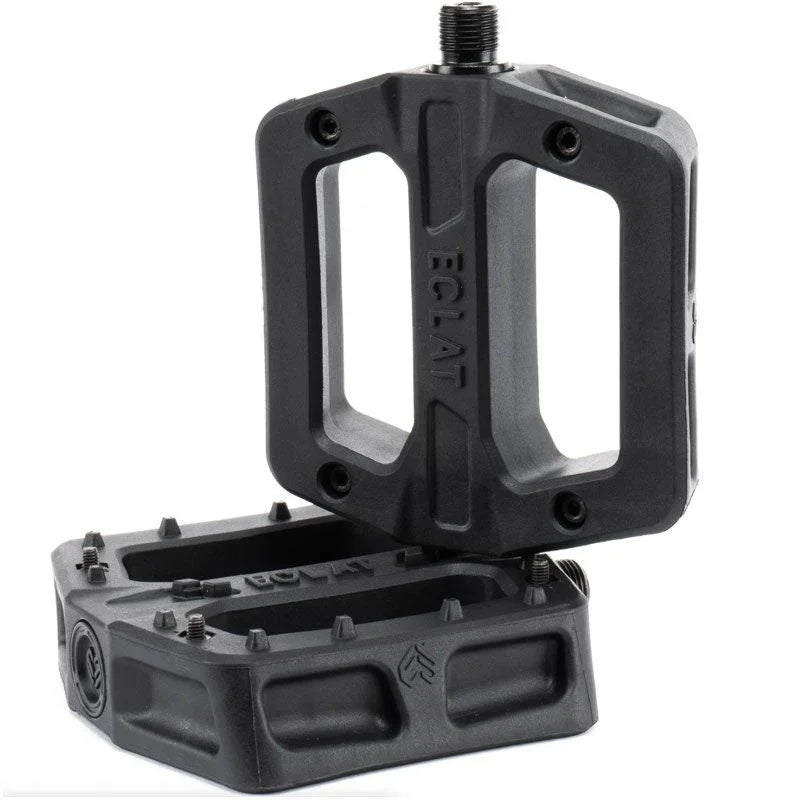 Pédales BMX noires ECLAT avec design robuste et grip texturé pour performance optimale