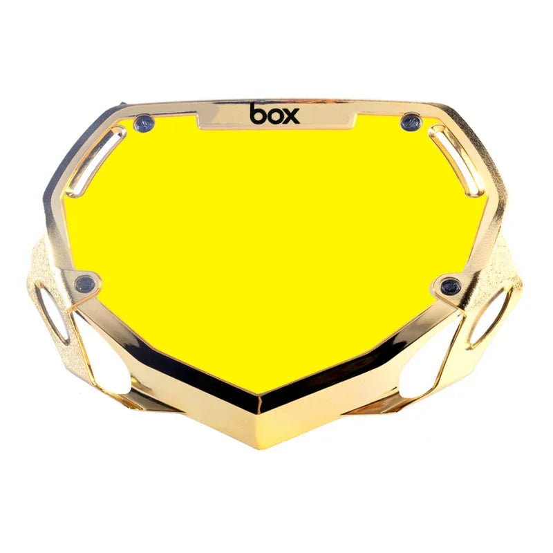 plaque box BMX jaune vif avec cadre doré et logo box