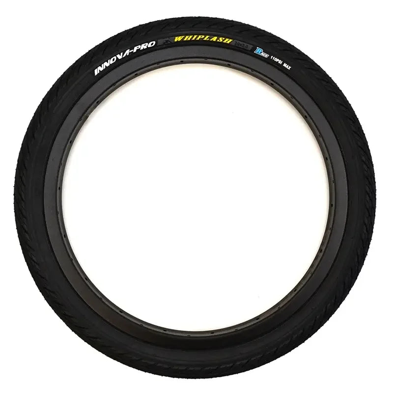 Black BMX bike tire with tread, Innova-Pro Whiplash 20x2.0, sidewall branding visible