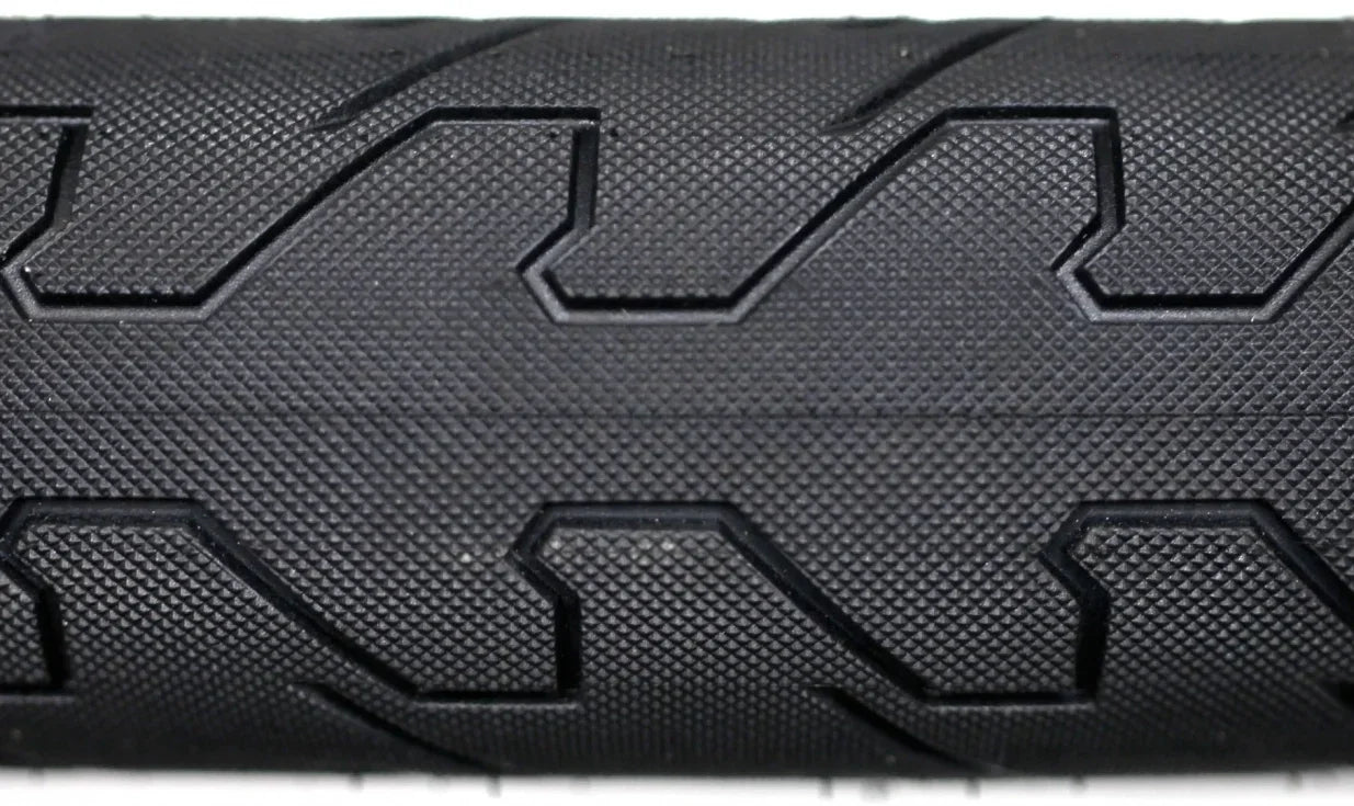 Poignée BMX noire texturée avec motifs géométriques pour une meilleure adhérence
