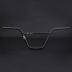 Black BMX handlebars Sierra model with white graphics on a dark background