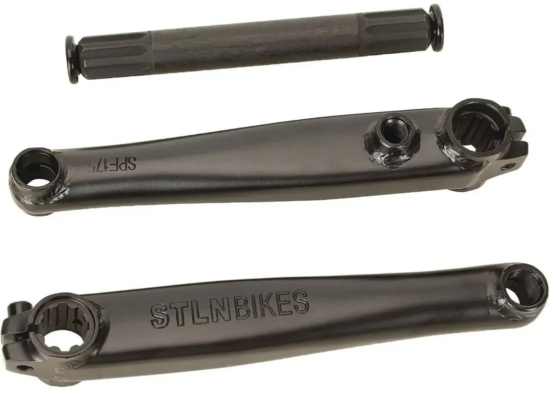 Three-piece 8-spline BMX cranks set in black with visible STLNBIKES engraving