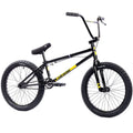 Vélo BMX noir et jaune avec cadre robuste, pneus larges et guidon haut pour tricks et freestyle