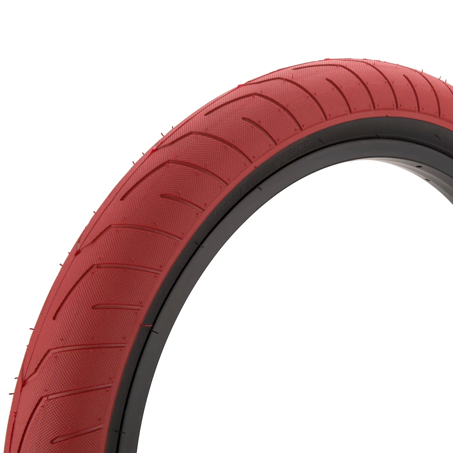Red BMX bike tire with black sidewall, textured tread, isolated on white background