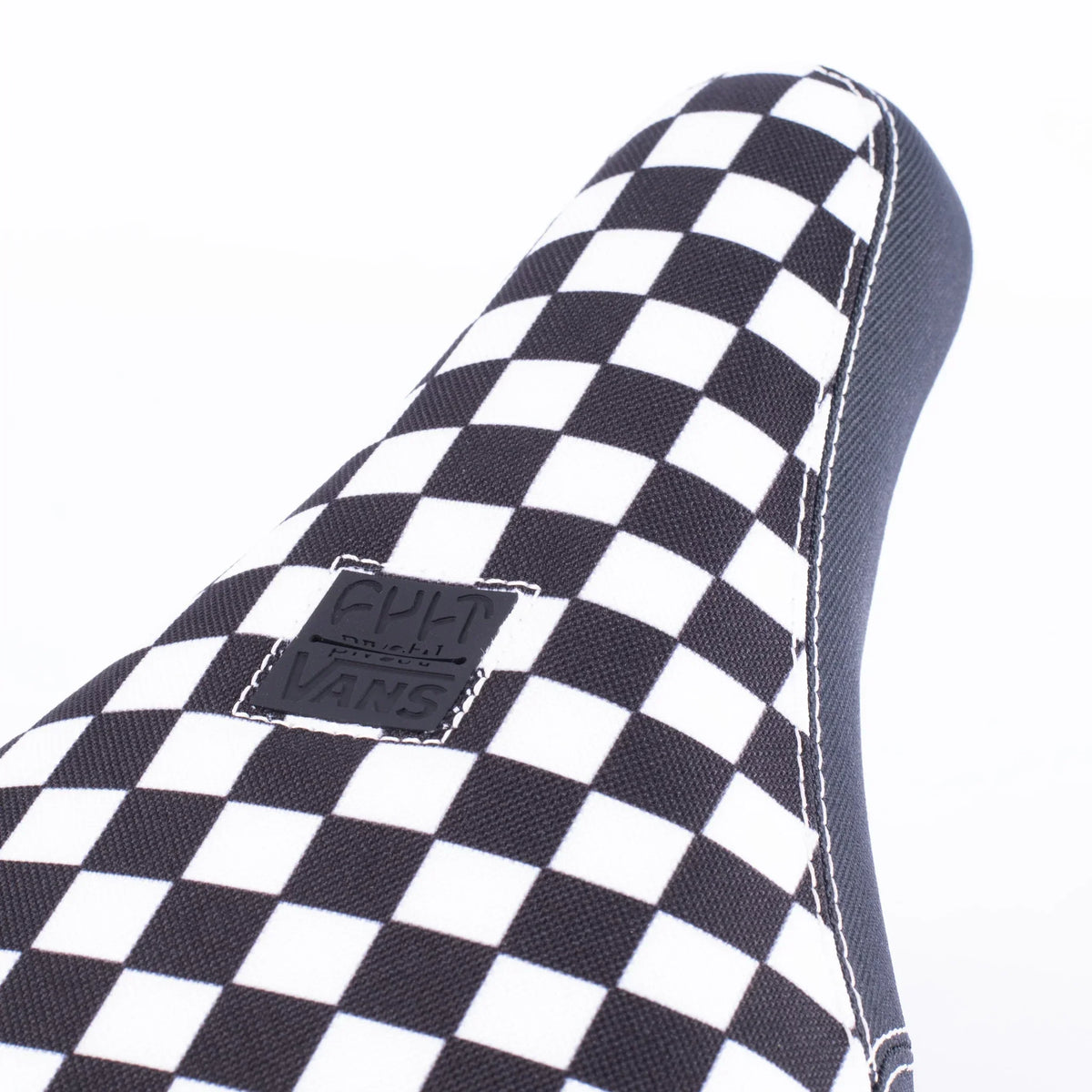 Selle BMX à motif damier noir et blanc avec logo Vans, design classique pour vélo de rue