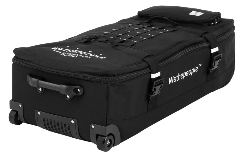 Sac à roulettes Wethepeople pour BMX, noir avec sangle et logo blanc, idéal pour transport vélo